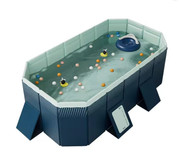Deflated inflatable pool filled with dirty water and debris
